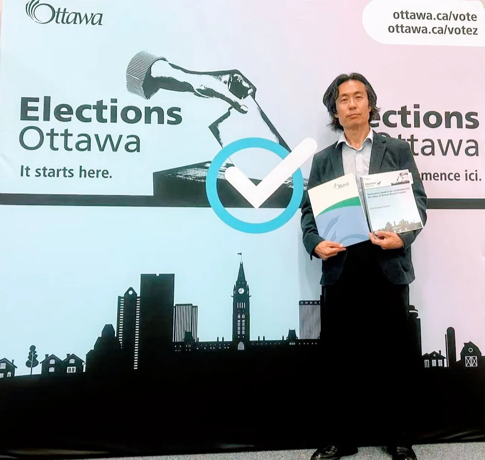 Dr. Kenneth Xi at the Elections Ottawa nomination desk