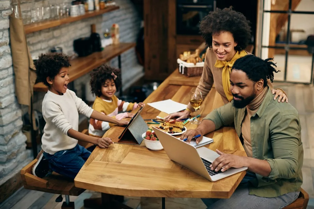 A family gathered around a kitchen table